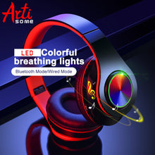Load image into Gallery viewer, B39 LED Colorful Breathing Lights Portable Folding Built-in FM Wireless Bluetooth Headphones With MIC Support TF Card Mp3 Player
